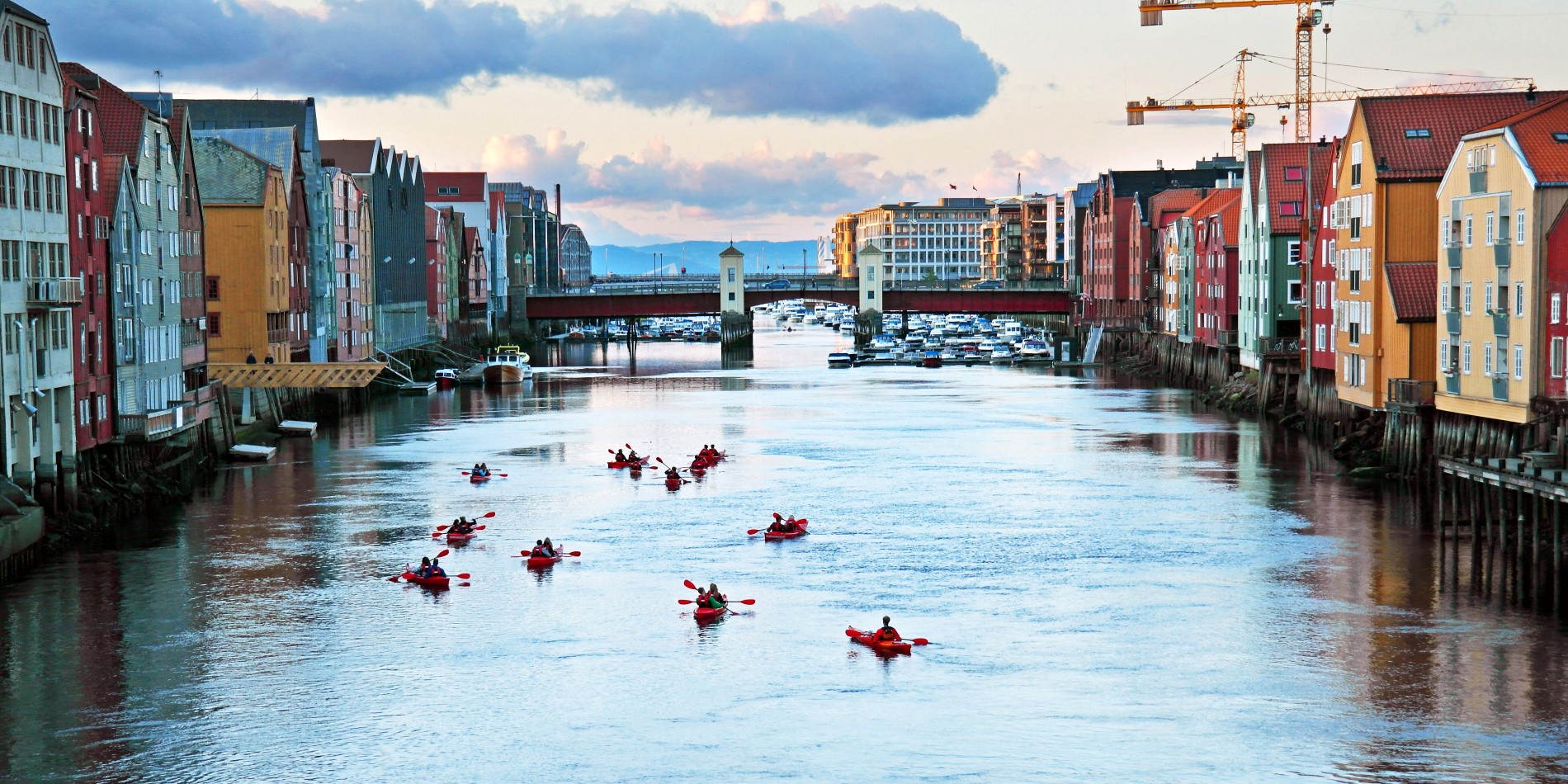 A group of kayaks paddeling on the river Nid, in Trondheim, Norway
