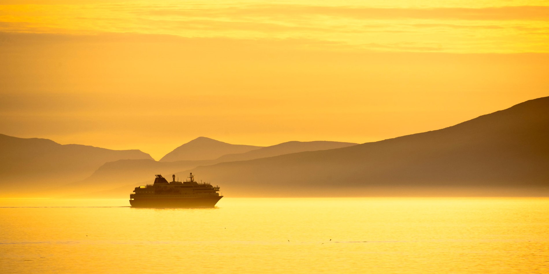 Hurtigruten sailing during one of those never-ending summer days in Norway